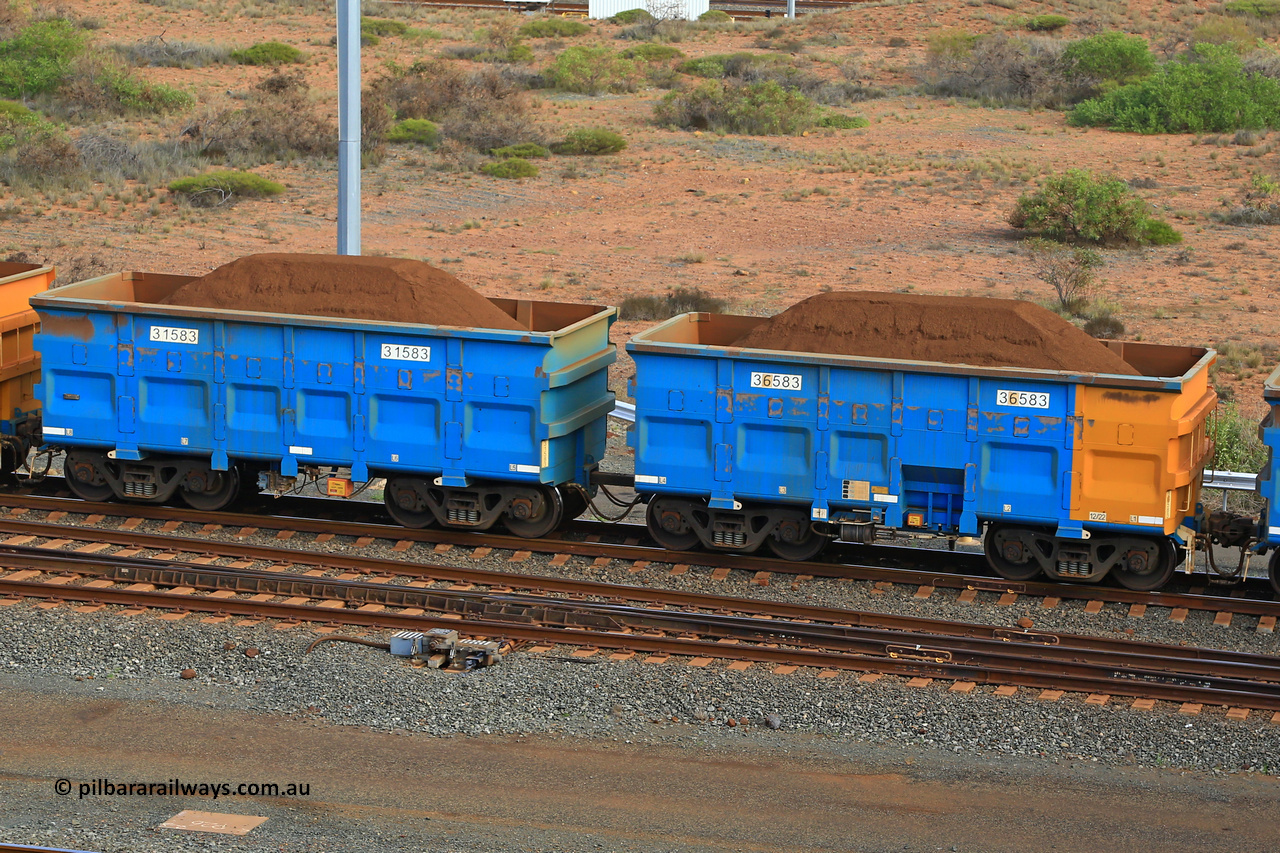 240619 0423
Cape Lambert yard, one of Rio Tinto's blue rakes with spring park brake and only electronic controlled pneumatic [ECP] braking, waggon pair 31583 is a master and is bar coupled to slave waggon 36583 built by China Northen as a Q type in 12/2022. Captured on June 19, 2024.
Keywords: 31583;36583;Q-type;China-Northern;Rio-ore-waggon;