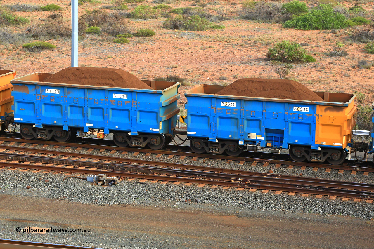 240619 0424
Cape Lambert yard, one of Rio Tinto's blue rakes with spring park brake and only electronic controlled pneumatic [ECP] braking, waggon pair 31510 is a master and is bar coupled to slave waggon 36510 built by China Northen as a Q type in 12/2022. Captured on June 19, 2024.
Keywords: 31510;36510;Q-type;China-Northern;Rio-ore-waggon;