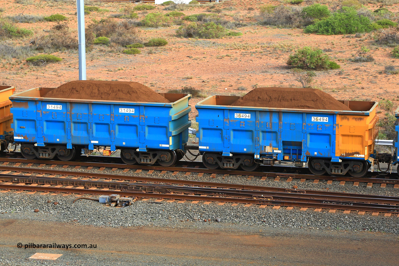 240619 0429
Cape Lambert yard, one of Rio Tinto's blue rakes with spring park brake and only electronic controlled pneumatic [ECP] braking, waggon pair 31494 is a master and is bar coupled to slave waggon 36494 built by China Northen as a Q type in 12/2022. Captured on June 19, 2024.
Keywords: 31494;36494;Q-type;China-Northern;Rio-ore-waggon;