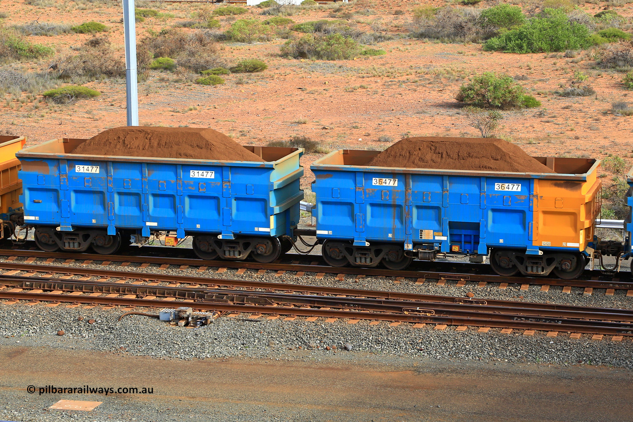 240619 0437
Cape Lambert yard, one of Rio Tinto's blue rakes with spring park brake and only electronic controlled pneumatic [ECP] braking, waggon pair 31477 is a master and is bar coupled to slave waggon 36477 built by China Northen as a Q type in 12/2022. Captured on June 19, 2024.
Keywords: 31477;36477;Q-type;China-Northern;Rio-ore-waggon;