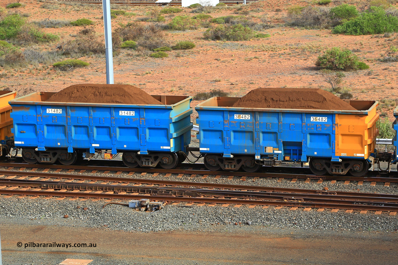 240619 0441
Cape Lambert yard, one of Rio Tinto's blue rakes with spring park brake and only electronic controlled pneumatic [ECP] braking, waggon pair 31482 is a master and is bar coupled to slave waggon 36482 built by China Northen as a Q type in 12/2022. Captured on June 19, 2024.
Keywords: 31482;36482;Q-type;China-Northern;Rio-ore-waggon;
