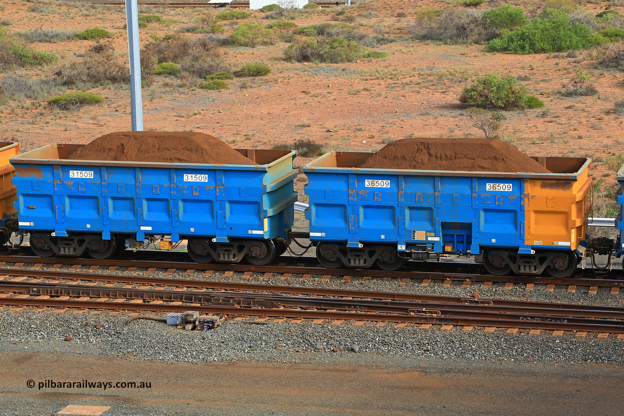 240619 0445
Cape Lambert yard, one of Rio Tinto's blue rakes with spring park brake and only electronic controlled pneumatic [ECP] braking, waggon pair 31509 is a master and is bar coupled to slave waggon 36509 built by China Northen as a Q type in 12/2022. Captured on June 19, 2024.
Keywords: 31509;36509;Q-type;China-Northern;Rio-ore-waggon;