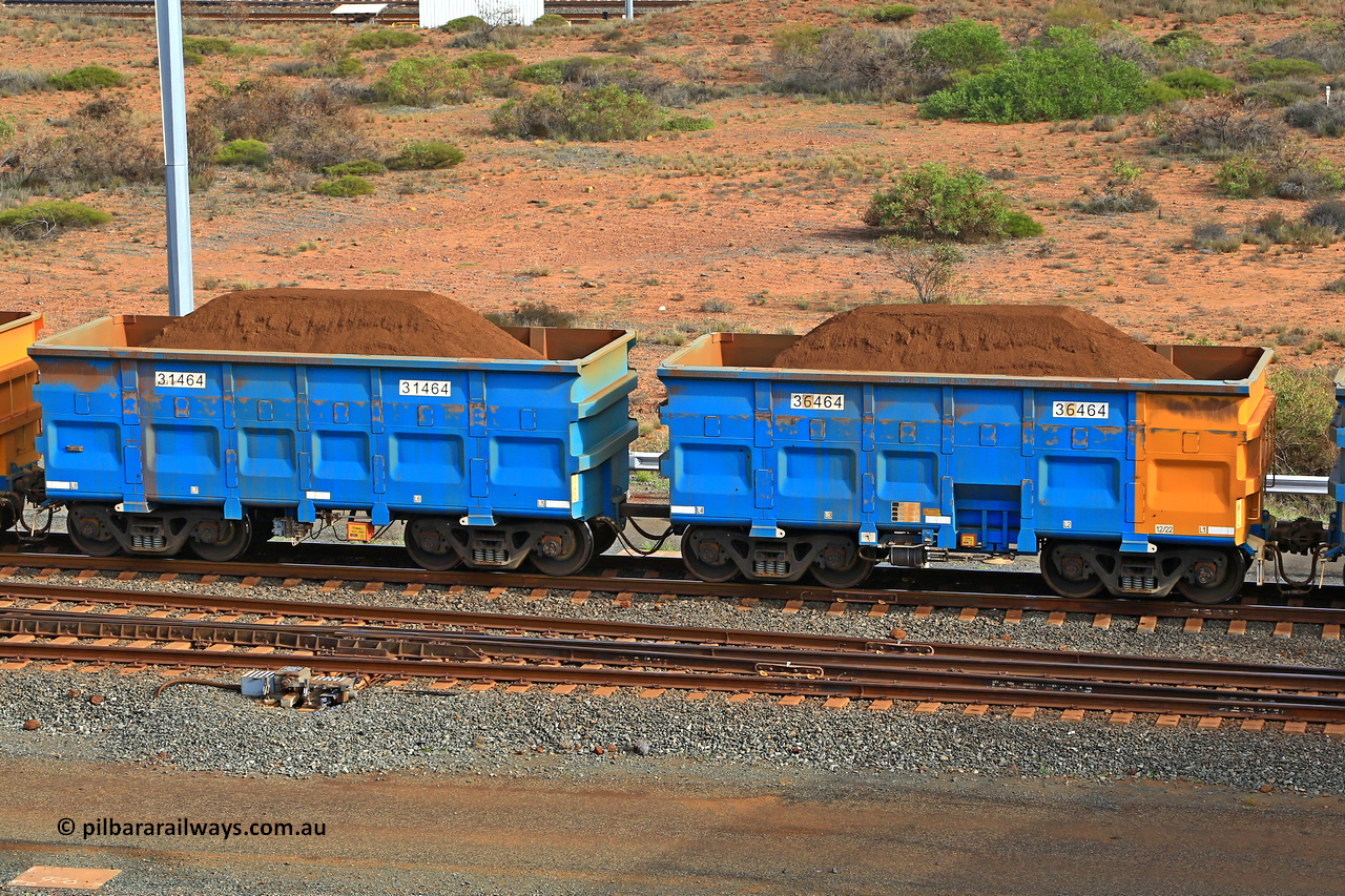 240619 0454
Cape Lambert yard, one of Rio Tinto's blue rakes with spring park brake and only electronic controlled pneumatic [ECP] braking, waggon pair 31464 is a master and is bar coupled to slave waggon 36464 built by China Northen as a Q type in 12/2022. Captured on June 19, 2024.
Keywords: 31464;36464;Q-type;China-Northern;Rio-ore-waggon;