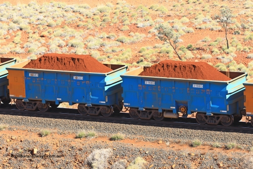240701 2390
Western Creek, 67 km, one of Rio Tinto's blue rakes with spring assisted park brake and only electronic controlled pneumatic [ECP] braking, waggon pair 31683 is a master and is bar coupled to slave waggon 36683 built by China Northen as a Q type in 11/2022. Captured on July 1, 2024.
Keywords: 31683;36683;Q-type;China-Northern;Rio-ore-waggon;