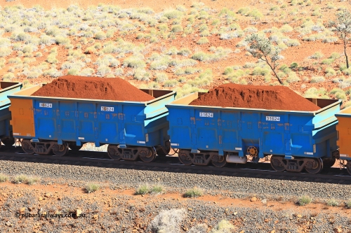 240701 2413
Western Creek, 67 km, one of Rio Tinto's blue rakes with spring assisted park brake and only electronic controlled pneumatic [ECP] braking, waggon pair 31624 is a master and is bar coupled to slave waggon 36624 built by China Northen as a Q type in 11/2022. Captured on July 1, 2024.
Keywords: 31624;36624;Q-type;China-Northern;Rio-ore-waggon;