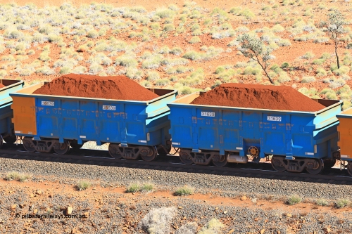 240701 2420
Western Creek, 67 km, one of Rio Tinto's blue rakes with spring assisted park brake and only electronic controlled pneumatic [ECP] braking, waggon pair 31639 is a master and is bar coupled to slave waggon 36639 built by China Northen as a Q type in 11/2022. Captured on July 1, 2024.
Keywords: 31639;36639;Q-type;China-Northern;Rio-ore-waggon;