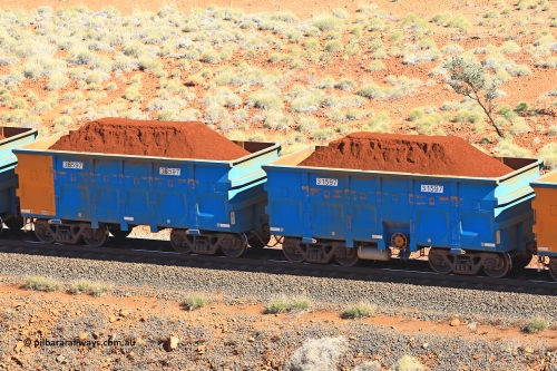 240701 2423
Western Creek, 67 km, one of Rio Tinto's blue rakes with spring assisted park brake and only electronic controlled pneumatic [ECP] braking, waggon pair 31597 is a master and is bar coupled to slave waggon 36597 built by China Northen as a Q type in 11/2022. Captured on July 1, 2024.
Keywords: 31597;36597;Q-type;China-Northern;Rio-ore-waggon;