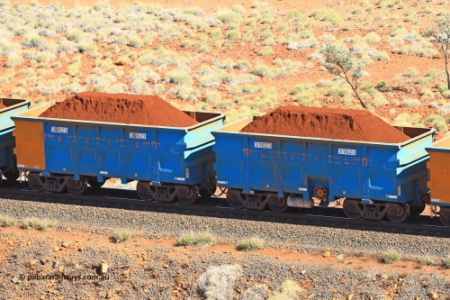 240701 2433
Western Creek, 67 km, one of Rio Tinto's blue rakes with spring assisted park brake and only electronic controlled pneumatic [ECP] braking, waggon pair 31623 is a master and is bar coupled to slave waggon 36623 built by China Northen as a Q type in 11/2022. Captured on July 1, 2024.
Keywords: 31623;36623;Q-type;China-Northern;Rio-ore-waggon;