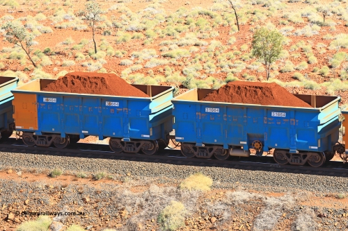 240701 2457
Western Creek, 67 km, one of Rio Tinto's blue rakes with spring assisted park brake and only electronic controlled pneumatic [ECP] braking, waggon pair 31664 is a master and is bar coupled to slave waggon 36664 built by China Northen as a Q type in 11/2022. Captured on July 1, 2024.
Keywords: 31664;36664;Q-type;China-Northern;Rio-ore-waggon;