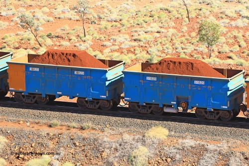240701 2467
Western Creek, 67 km, one of Rio Tinto's blue rakes with spring assisted park brake and only electronic controlled pneumatic [ECP] braking, waggon pair 31620 is a master and is bar coupled to slave waggon 36620 built by China Northen as a Q type in 11/2022. Captured on July 1, 2024.
Keywords: 31620;36620;Q-type;China-Northern;Rio-ore-waggon;