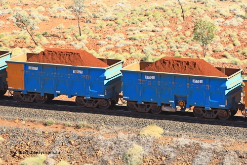 240701 2473
Western Creek, 67 km, one of Rio Tinto's blue rakes with spring assisted park brake and only electronic controlled pneumatic [ECP] braking, waggon pair 31521 is a master and is bar coupled to slave waggon 36521 built by China Northen as a Q type in 12/2022. Captured on July 1, 2024.
Keywords: 31521;36521;Q-type;China-Northern;Rio-ore-waggon;