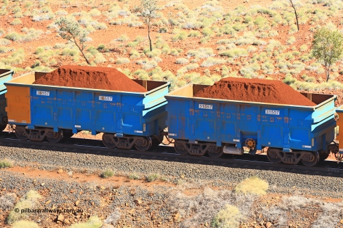 240701 2476
Western Creek, 67 km, one of Rio Tinto's blue rakes with spring assisted park brake and only electronic controlled pneumatic [ECP] braking, waggon pair 31557 is a master and is bar coupled to slave waggon 36557 built by China Northen as a Q type in 12/2022. Captured on July 1, 2024.
Keywords: 31557;36557;Q-type;China-Northern;Rio-ore-waggon;