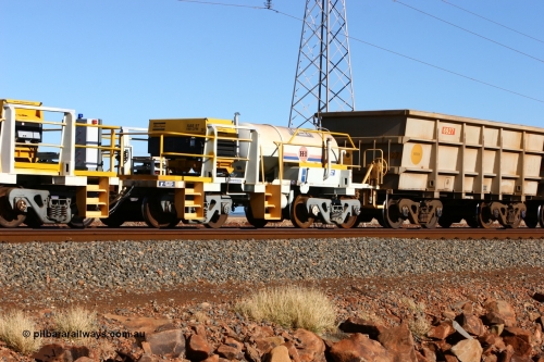 IC-6 060723 7685
Original Hamersley Iron compressor waggon set IC-6 which were made from cutting down condemned ore waggons and then fitting Atlas Copco XAS 97 air compressors, receiver tanks and fuel tanks. Seen here on the causeway just outside 7 Mile. July 23, 2006.
Keywords: IC-6;IC-7;rio-compressor-waggon;