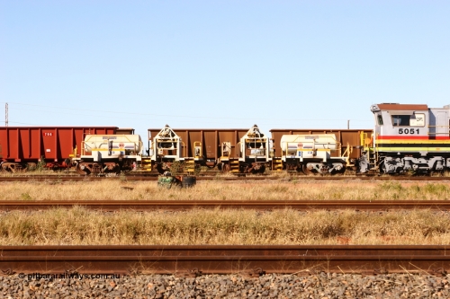 IC-1 060723 7824
Original Hamersley Iron compressor waggon sets IC-1 and IC-3 which were made from cutting down condemned ore waggons and then fitting Atlas Copco XAS 97 air compressors, receiver tanks and fuel tanks. The compressors have been fitted to a swing cradle to limit the in-train forces during the unloading process. 7 Mile July 23, 2006.
Keywords: IC-1;IC-3;rio-compressor-waggon;