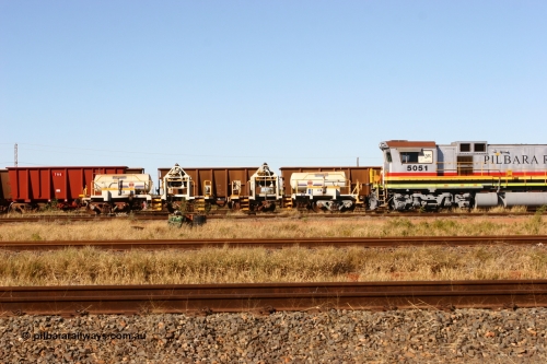 IC-1 060723 7825
Original Hamersley Iron compressor waggon sets IC-1 and IC-3 which were made from cutting down condemned ore waggons and then fitting Atlas Copco XAS 97 air compressors, receiver tanks and fuel tanks. The compressors have been fitted to a swing cradle to limit the in-train forces during the unloading process. 7 Mile July 23, 2006.
Keywords: IC-1;IC-3;rio-compressor-waggon;