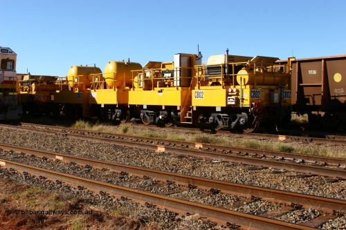 CB02 060723 7834
Rio Tinto compressor waggon set CB 02, compressor control waggon with two diesel powered Atlas Copco XAS 97's and the receiver waggon with two air tanks or receivers. Note the waggons are cut down ore waggons. Seen here inside 7 Mile. July 23, 2006.
Keywords: CB02;rio-compressor-waggon;