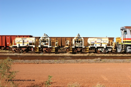 IC-1 060723 7841
Original Hamersley Iron compressor waggon sets IC-1 and IC-3 which were made from cutting down condemned ore waggons and then fitting Atlas Copco XAS 97 air compressors, receiver tanks and fuel tanks. The compressors have been fitted to a swing cradle to limit the in-train forces during the unloading process. 7 Mile July 23, 2006.
Keywords: IC-1;IC-3;rio-compressor-waggon;