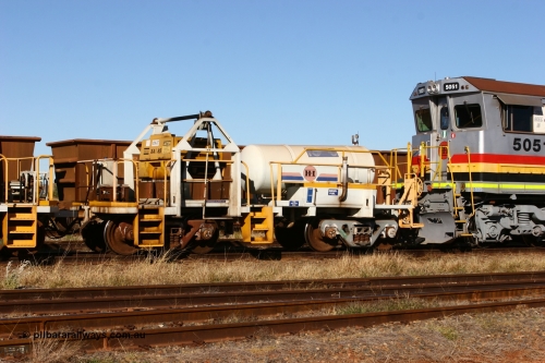 IC-3 060723 7844
Original Hamersley Iron compressor waggon set IC-3 which were made from cutting down condemned ore waggons and then fitting Atlas Copco XAS 97 air compressors, receiver tanks and fuel tanks. The compressors have been fitted to a swing cradle to limit the in-train forces during the unloading process. 7 Mile July 23, 2006.
Keywords: IC-3;rio-compressor-waggon;