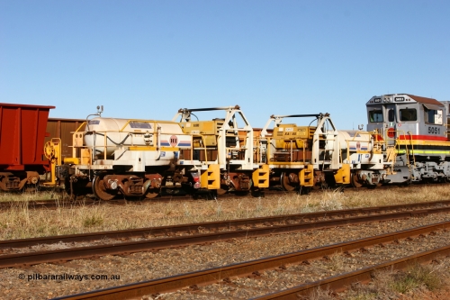 IC-1 060723 7845
Original Hamersley Iron compressor waggon sets IC-1 and IC-3 which were made from cutting down condemned ore waggons and then fitting Atlas Copco XAS 97 air compressors, receiver tanks and fuel tanks. The compressors have been fitted to a swing cradle to limit the in-train forces during the unloading process. 7 Mile July 23, 2006.
Keywords: IC-1;IC-3;rio-compressor-waggon;