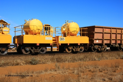 CB05 100330 8067
Rio Tinto compressor waggon set CB 05, receiver waggon with two air tanks or receivers. Note the waggons are cut down ore waggons and the wheels are marked 70 kph max. Seen here just outside of 7 Mile. March 30, 2010.
Keywords: CB05;rio-compressor-waggon;
