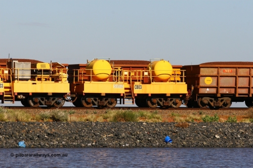 CB03 110602 8647
Rio Tinto compressor waggon set CB 03, receiver waggon with two air tanks or receivers. These are built on former ore waggons that have been cut down. Seen here on the causeway just outside of 7 Mile. June 2, 2011.
Keywords: CB03;rio-compressor-waggon;