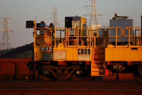 CB09 170510 8284
Rio Tinto compressor waggon set CB 09, compressor control waggon with two diesel powered Kaeser M57 Utility air compressors. Note the waggons are modified ore waggon frames. Seen here at Cape Lambert. May 10, 2017.
Keywords: CB09;rio-compressor-waggon;