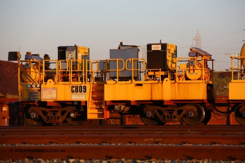 CB09 170510 8293
Rio Tinto compressor waggon set CB 09, compressor control waggon with two diesel powered Kaeser M57 Utility air compressors. Note the waggons are modified ore waggon frames. Seen here at Cape Lambert. May 10, 2017.
Keywords: CB09;rio-compressor-waggon;