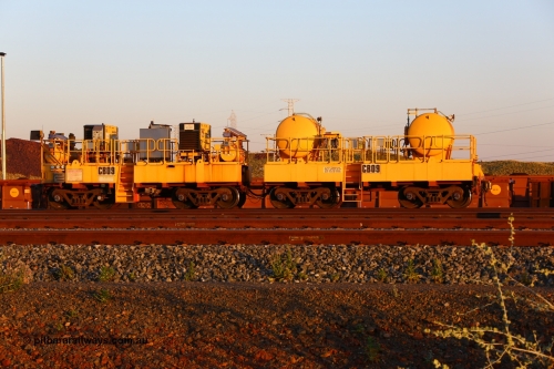 CB09 170510 8294
Rio Tinto compressor waggon set CB 09, compressor control waggon with two diesel powered Kaeser M57 Utility air compressors and the receiver waggon with two air tanks or receivers. Note the waggons are modified ore waggon frames. Seen here at Cape Lambert. May 10, 2017.
Keywords: CB09;rio-compressor-waggon;