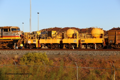 CB12 170728 09678
Rio Tinto compressor waggon set CB 12, compressor control waggon with two diesel powered Kaeser M57 Utility air compressors and the receiver waggon with two air tanks or receivers. Note the waggons are modified ore waggon frames. Seen here at Cape Lambert. July 28, 2017.
Keywords: CB12;rio-compressor-waggon;