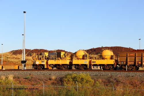 CB12 170728 09687
Rio Tinto compressor waggon set CB 12, compressor control waggon with two diesel powered Kaeser M57 Utility air compressors and the receiver waggon with two air tanks or receivers. Note the waggons are modified ore waggon frames. Seen here at Cape Lambert. July 28, 2017.
Keywords: CB12;rio-compressor-waggon;