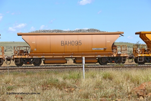 210322 9569
Near Gecko on Rio Tinto's Dampier - Tom Price line is Chinese built ballast waggon BAH 095 on a loaded ballast rake. Location is roughly [url=https://goo.gl/maps/XZkGLreipQwHrTjw9]here[/url]. 22nd March 2021.
Keywords: BAH-type;BAH095;Rio-ballast-waggon;