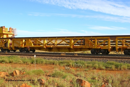 RTS002 210510 1118
Near Gull on the Rio Tinto Dampier - Tom Price line at the 101.5 km, RTS type straddle crane carrying rail waggon RTS 002 on Rio Tinto's Gemco Rail built rail train consist. May 10, 2021. [url=https://goo.gl/maps/9WbRn1E4vP6a1YbN8]Location[/url].
Keywords: RTS-type;RTS002;Gemco-Rail-WA;