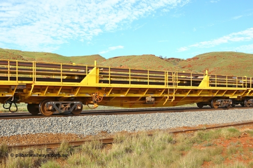RTW020 210510 1133
Near Galah on the Rio Tinto Dampier - Tom Price line at the 89.5 km, RTW type intermediate rail waggon RTW 020 on Rio Tinto's Gemco Rail built rail train consist. May 10, 2021. [url=https://goo.gl/maps/tSmgEtp7gcG7x24b9]Location[/url].
Keywords: RTW-type;RTW020;Gemco-Rail-WA
