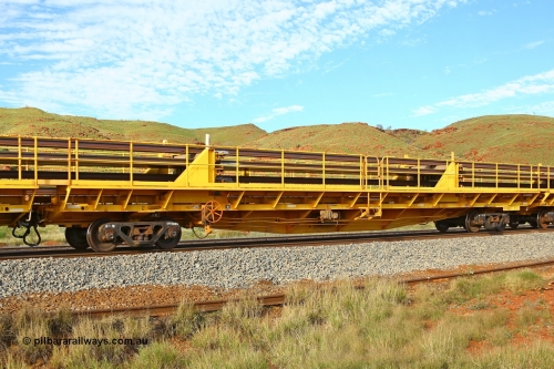 RTW018 210510 1135
Near Galah on the Rio Tinto Dampier - Tom Price line at the 89.5 km, RTW type intermediate rail waggon RTW 018 on Rio Tinto's Gemco Rail built rail train consist. May 10, 2021. [url=https://goo.gl/maps/tSmgEtp7gcG7x24b9]Location[/url].
Keywords: RTW-type;RTW018;Gemco-Rail-WA
