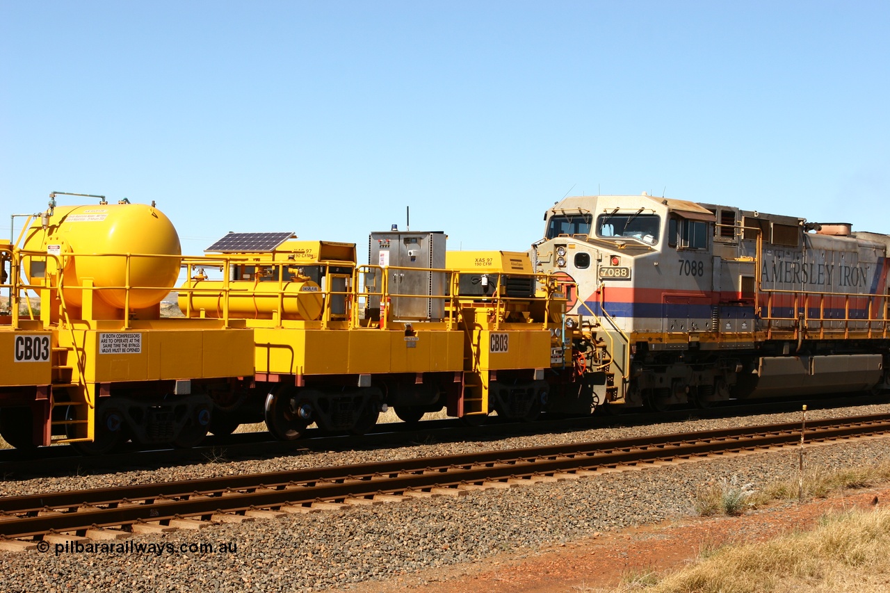 060715 6948
Rio Tinto compressor waggon set CB 03, compressor control waggon with two diesel powered Atlas Copco XAS 97's. These are built on former ore waggons that have been cut down. Seen here just outside of 7 Mile. 15th July 2006.
Keywords: CB03;rio-compressor-waggon;