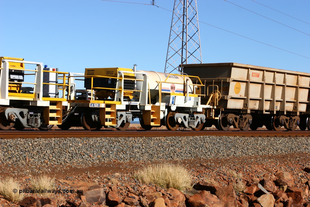 060723 7685
Original Hamersley Iron compressor waggon set IC-6 which were made from cutting down condemned ore waggons and then fitting Atlas Copco XAS 97 air compressors, receiver tanks and fuel tanks. Seen here on the causeway just outside 7 Mile. 23rd July 2006.
Keywords: IC-6;IC-7;rio-compressor-waggon;