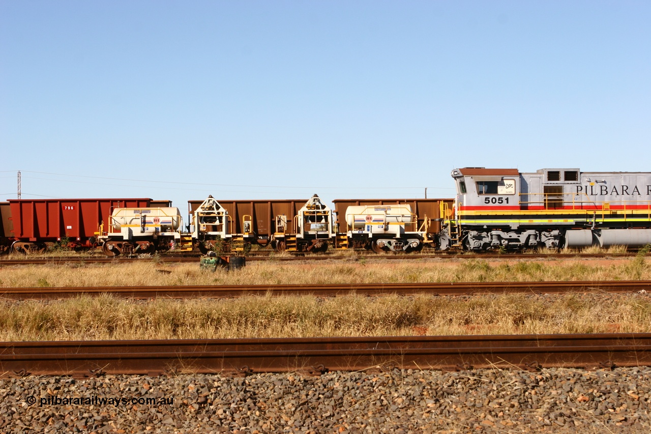 060723 7825
Original Hamersley Iron compressor waggon sets IC-1 and IC-3 which were made from cutting down condemned ore waggons and then fitting Atlas Copco XAS 97 air compressors, receiver tanks and fuel tanks. The compressors have been fitted to a swing cradle to limit the in-train forces during the unloading process. 7 Mile 23rd July 2006.
Keywords: IC-1;IC-3;rio-compressor-waggon;