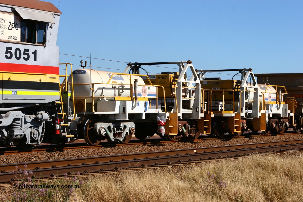 060724 7864
Original Hamersley Iron compressor waggon sets IC-1 and IC-3 which were made from cutting down condemned ore waggons and then fitting Atlas Copco XAS 97 air compressors, receiver tanks and fuel tanks. The compressors have been fitted to a swing cradle to limit the in-train forces during the unloading process. 7 Mile 24th July 2006.
Keywords: IC-1;IC-3;rio-compressor-waggon;