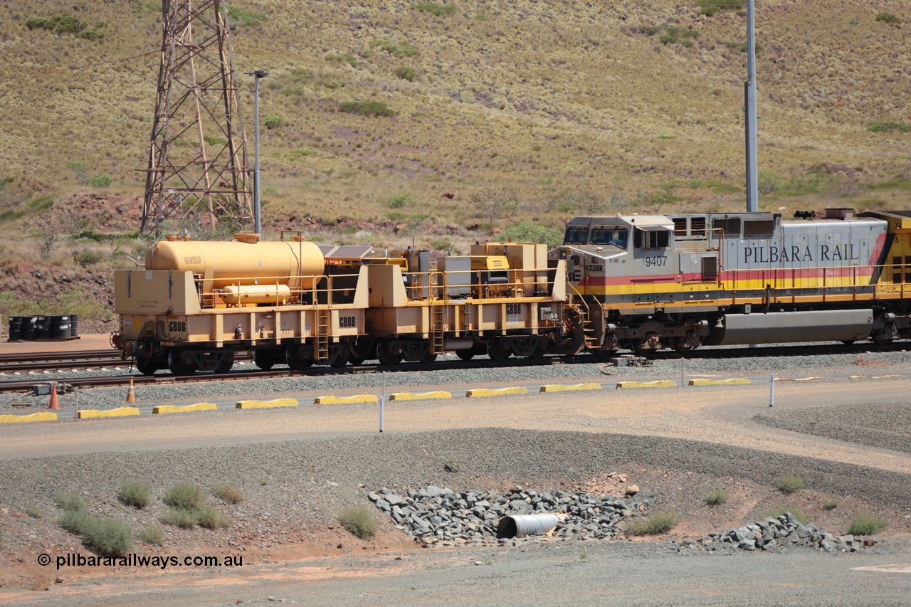 131122 3312
Rio Tinto compressor waggon set CB 08, has been upgraded from the original Robe River compressor waggon set IC 22 with air receiver and IC 23 with two Atlas Copco XAS 97 units replacing the original Ingersoll Rand air compressors. These waggons are ballasted to 100 tonnes each and are modified ore waggons. Cape Lambert 22nd November 2013.
Keywords: IC22;IC23;robe-compressor-waggon;CB08;