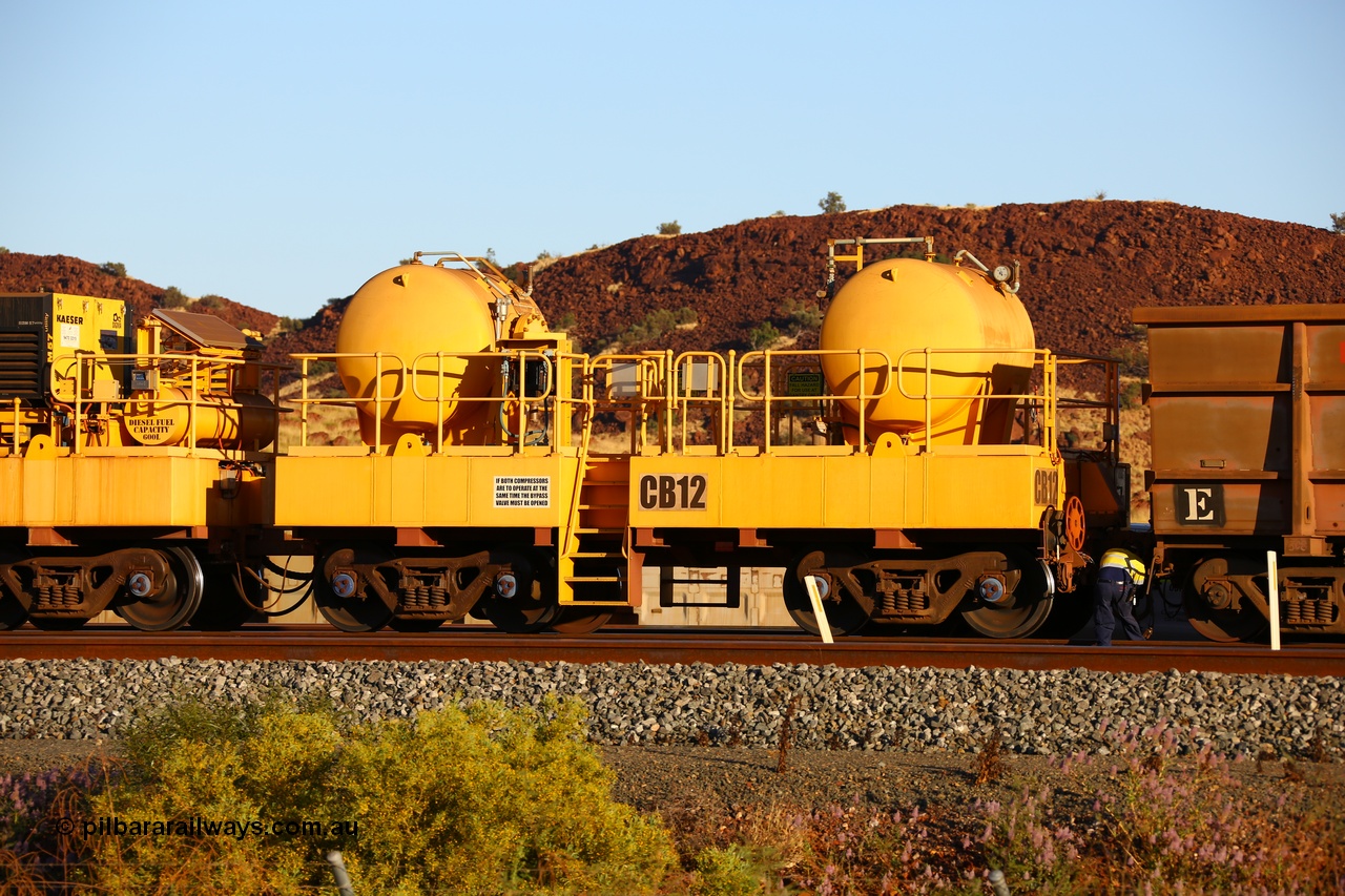 170728 09688
Rio Tinto compressor waggon set CB 12, receiver waggon with two air tanks or receivers. Note the waggons are modified ore waggon frames. Seen here at Cape Lambert. 28th July 2017.
Keywords: CB12;rio-compressor-waggon;