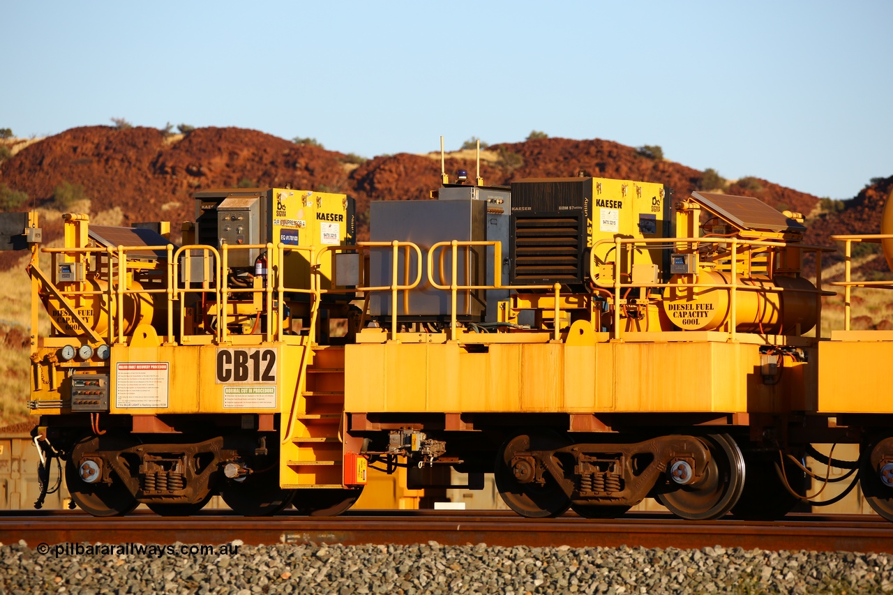 170728 09689
Rio Tinto compressor waggon set CB 12, compressor control waggon with two diesel powered Kaeser M57 Utility air compressors. Note the waggons are modified ore waggon frames. Seen here at Cape Lambert. 28th July 2017.
Keywords: CB12;rio-compressor-waggon;