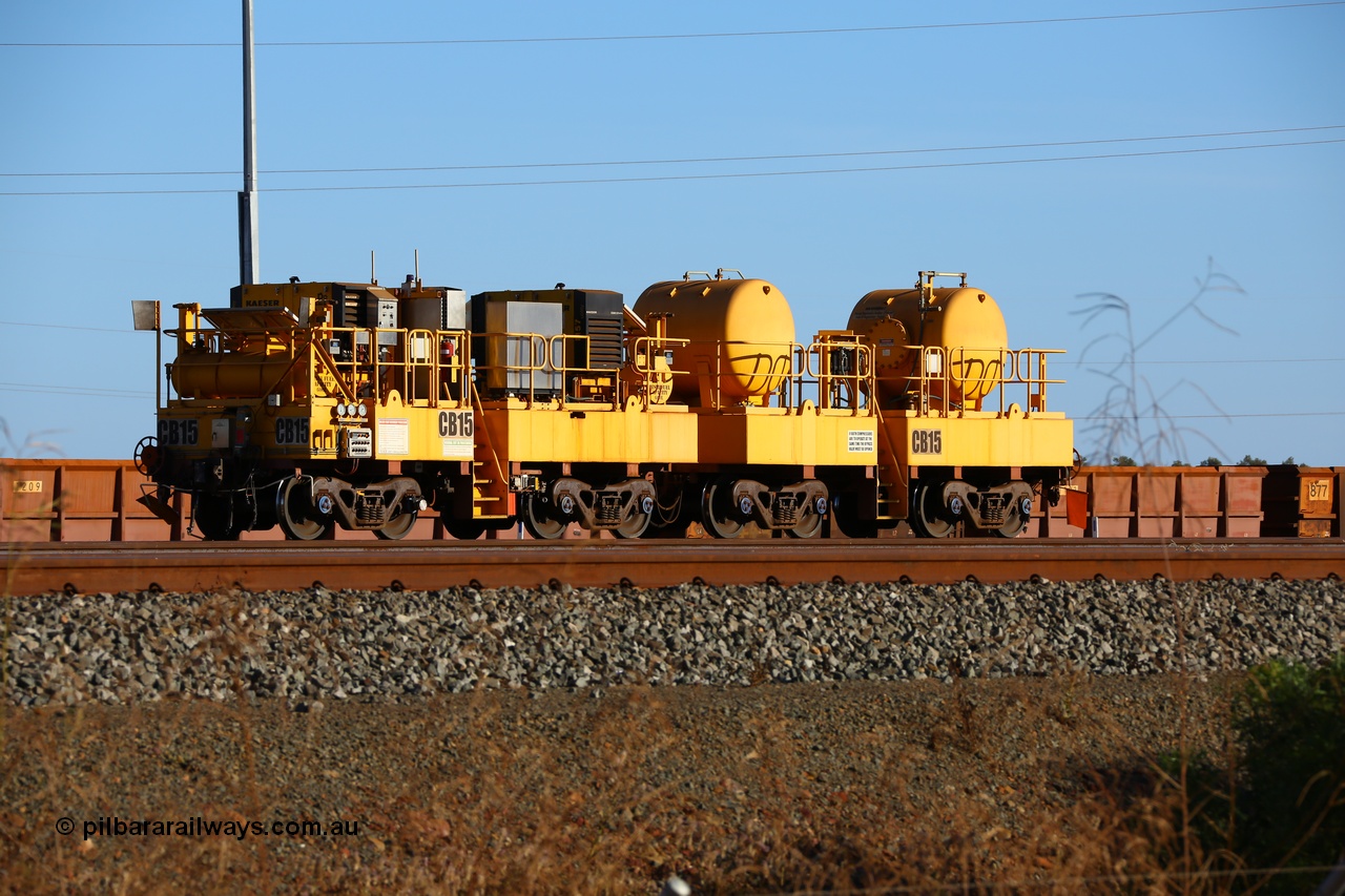 171018 0734
Rio Tinto compressor waggon set CB 15, compressor control waggon with two diesel powered Kaeser M57 Utility air compressors and the receiver waggon with two air tanks or receivers. Note the waggons are modified ore waggon frames. Seen here at Cape Lambert. 18th October 2017.
Keywords: CB15;rio-compressor-waggon;