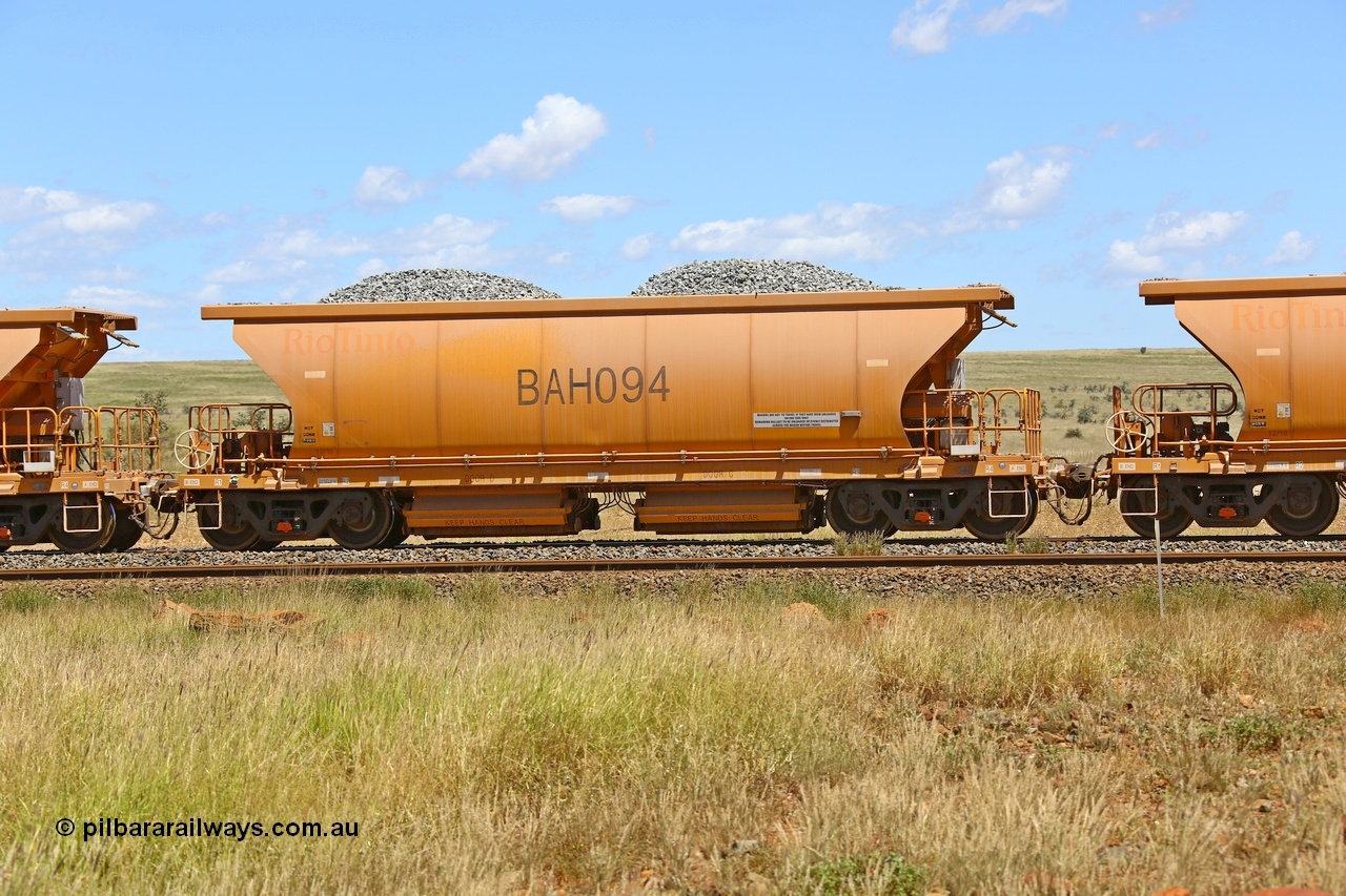 210322 9572
Near Gecko on Rio Tinto's Dampier - Tom Price line is Chinese built ballast waggon BAH 094 on a loaded ballast rake. Location is roughly [url=https://goo.gl/maps/XZkGLreipQwHrTjw9]here[/url]. 22nd March 2021.
Keywords: BAH-type;BAH094;Rio-ballast-waggon;