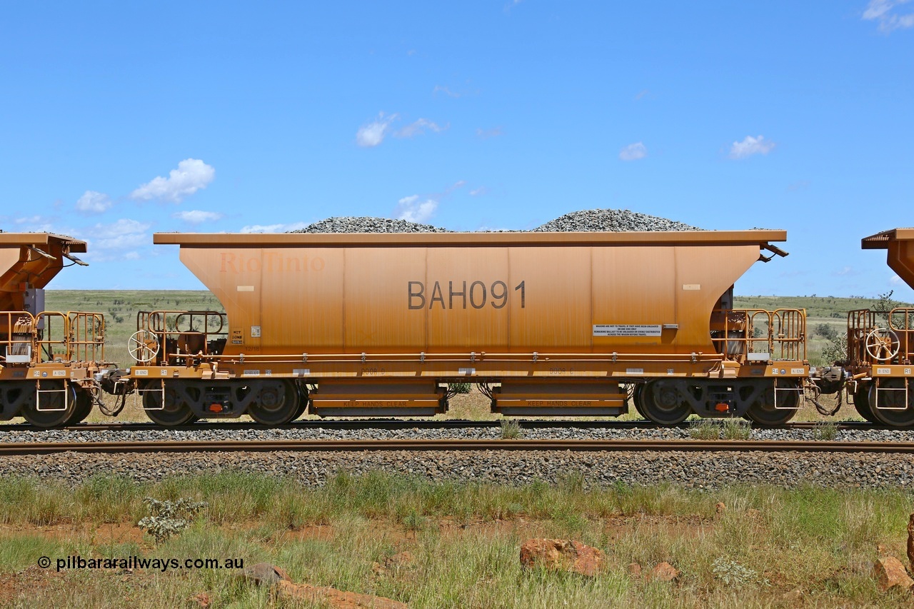 210322 9575
Near Gecko on Rio Tinto's Dampier - Tom Price line is Chinese built ballast waggon BAH 091 on a loaded ballast rake. Location is roughly [url=https://goo.gl/maps/XZkGLreipQwHrTjw9]here[/url]. 22nd March 2021.
Keywords: BAH-type;BAH091;Rio-ballast-waggon;