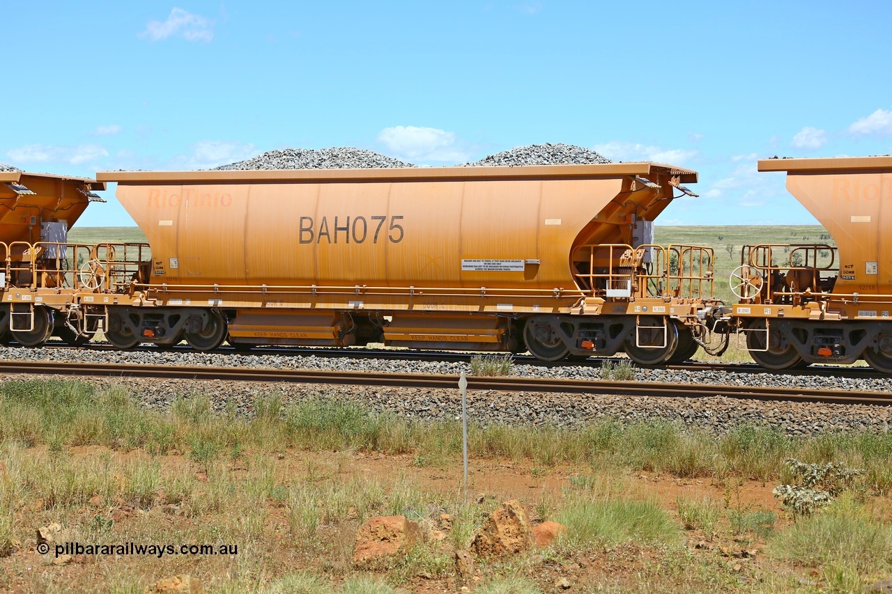 210322 9579
Near Gecko on Rio Tinto's Dampier - Tom Price line is Chinese built ballast waggon BAH 075 on a loaded ballast rake. Location is roughly [url=https://goo.gl/maps/XZkGLreipQwHrTjw9]here[/url]. 22nd March 2021.
Keywords: BAH-type;BAH075;Rio-ballast-waggon;
