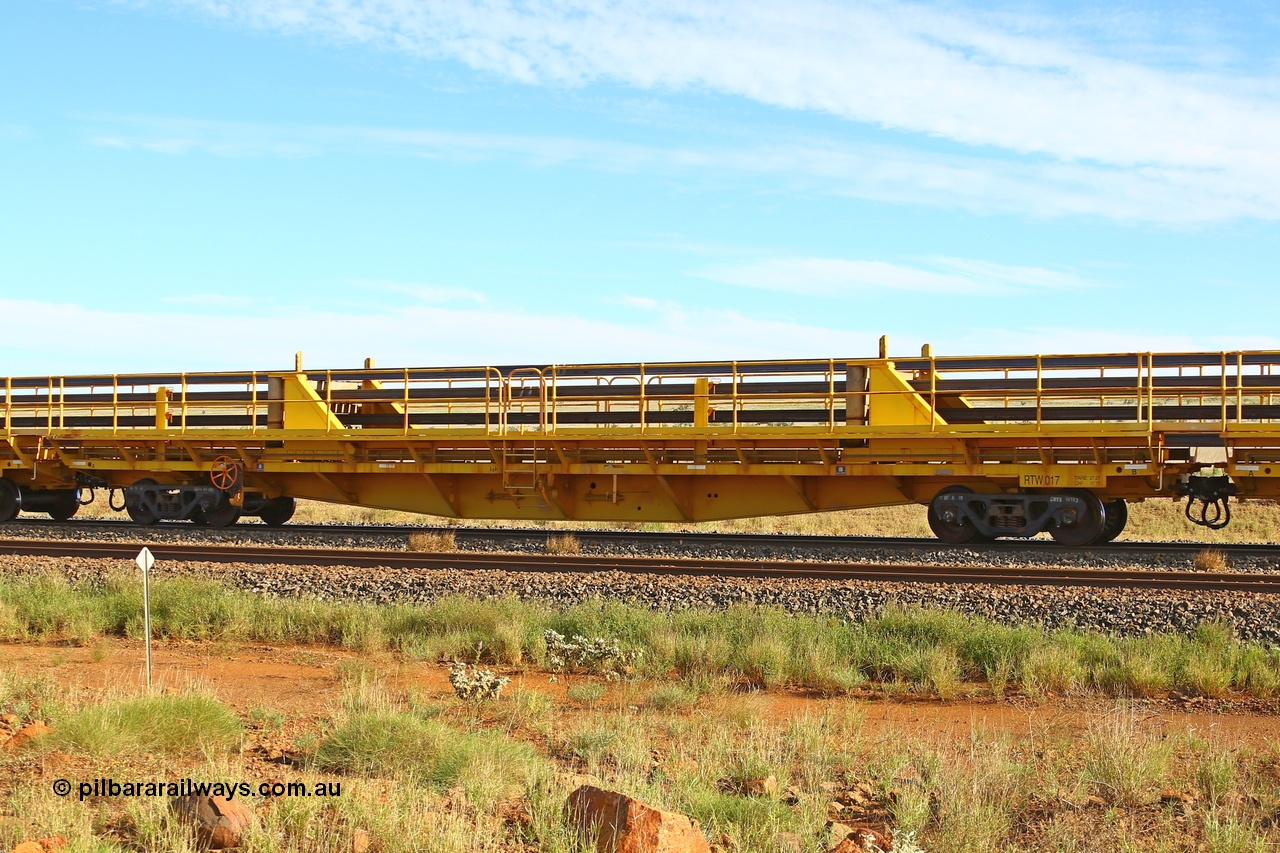 210510 1103
Near Gull on the Rio Tinto Dampier - Tom Price line at the 101.5 km, RTW type intermediate rail waggon RTB 017 on Rio Tinto's Gemco Rail built rail train consist. 10th May 2021. [url=https://goo.gl/maps/9WbRn1E4vP6a1YbN8]Location[/url].
Keywords: RTW-type;RTW017;Gemco-Rail-WA;