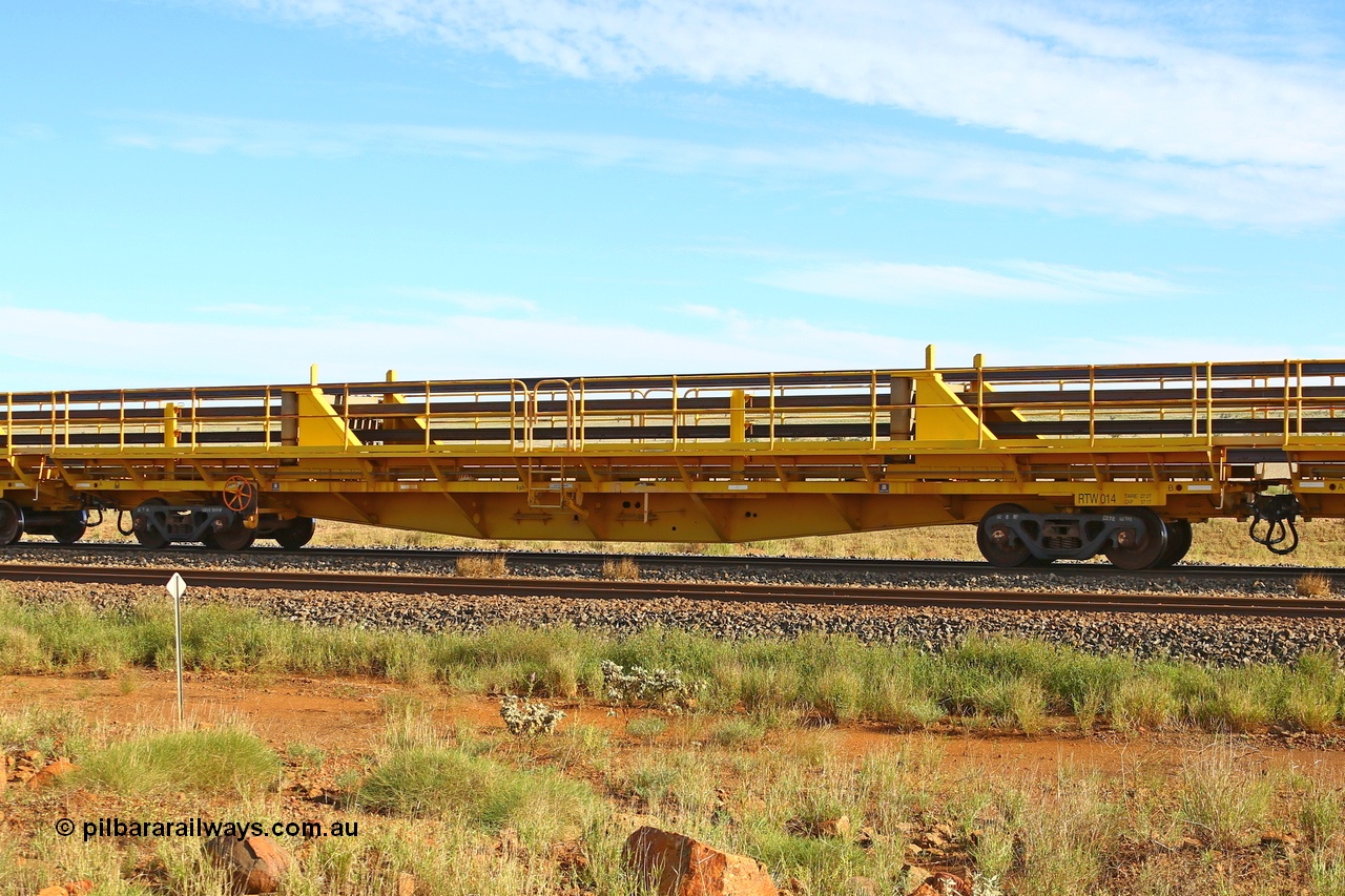 210510 1106
Near Gull on the Rio Tinto Dampier - Tom Price line at the 101.5 km, RTW type intermediate rail waggon RTB 014 on Rio Tinto's Gemco Rail built rail train consist. 10th May 2021. [url=https://goo.gl/maps/9WbRn1E4vP6a1YbN8]Location[/url].
Keywords: RTW-type;RTW014;Gemco-Rail-WA;