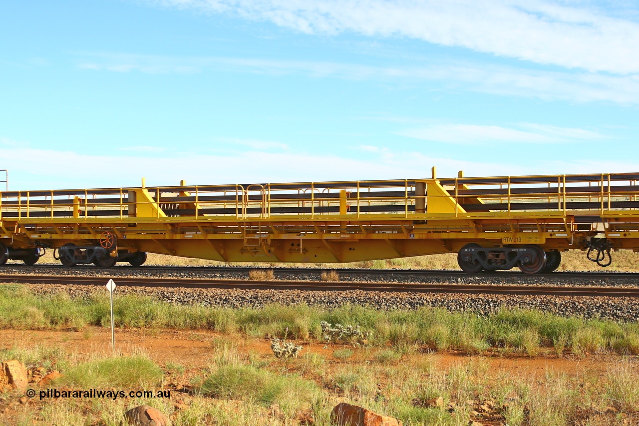 210510 1107
Near Gull on the Rio Tinto Dampier - Tom Price line at the 101.5 km, RTW type intermediate rail waggon RTB 013 on Rio Tinto's Gemco Rail built rail train consist. 10th May 2021. [url=https://goo.gl/maps/9WbRn1E4vP6a1YbN8]Location[/url].
Keywords: RTW-type;RTW013;Gemco-Rail-WA;