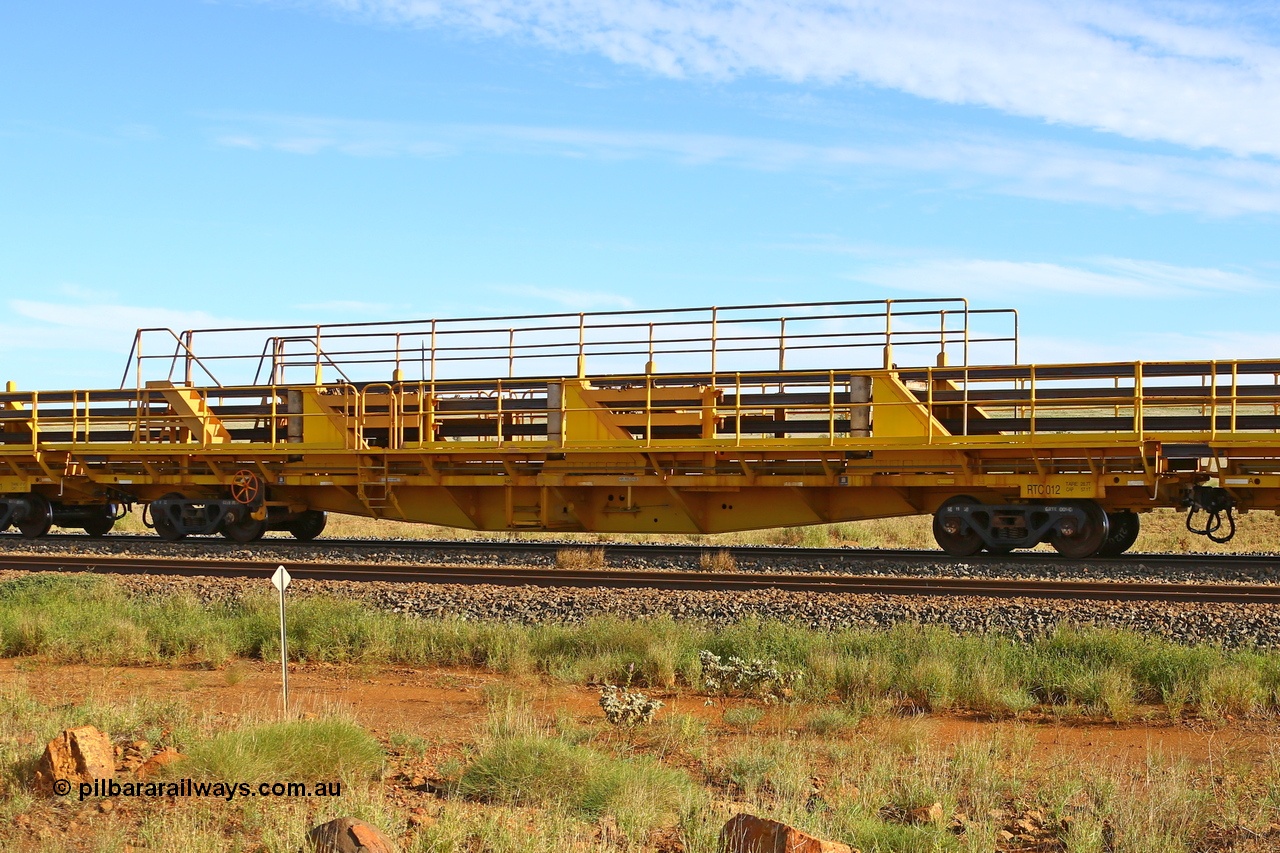 210510 1108
Near Gull on the Rio Tinto Dampier - Tom Price line at the 101.5 km, RTC type centre rail waggon RTC 012 on Rio Tinto's Gemco Rail built rail train consist. 10th May 2021. [url=https://goo.gl/maps/9WbRn1E4vP6a1YbN8]Location[/url].
Keywords: RTC-type;RTC012;Gemco-Rail-WA;