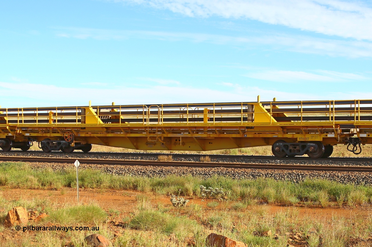 210510 1113
Near Gull on the Rio Tinto Dampier - Tom Price line at the 101.5 km, RTW type intermediate rail waggon RTB 007 on Rio Tinto's Gemco Rail built rail train consist. 10th May 2021. [url=https://goo.gl/maps/9WbRn1E4vP6a1YbN8]Location[/url].
Keywords: RTW-type;RTW007;Gemco-Rail-WA;